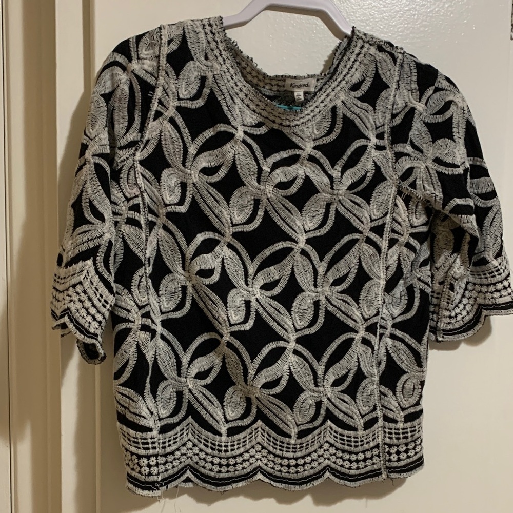 Chic Black and Cream Geometric Blouse